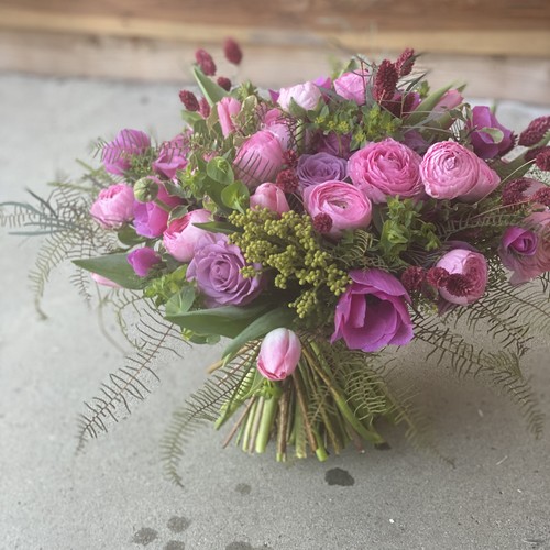 Pink and lavender garden rose hand-tied bouquet with ferns from floral design Raleigh NC